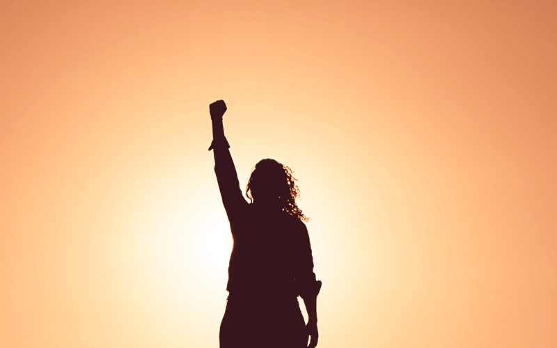 woman hand raised silhouette